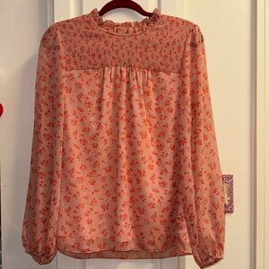 Pink Boden long-sleeved blouse with orange flowers size 8 for women.